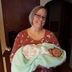 2018-07-29 14.46.54 Grandma gets to hold our precious grand-daughter