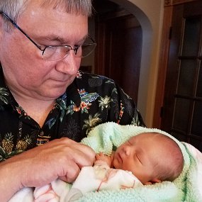 2018-07-29 14.53.58-2 Grandpa gets to hold our precious grand-daughter