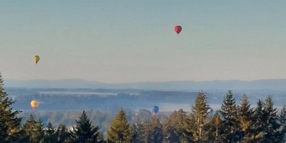 20240922_074706 Hot air balloons as seen from pour porch one morning