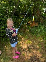 July - fishing 5 First time fishing with her own pole